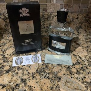Creed Aventus Fragrance with Black and Silver Accents